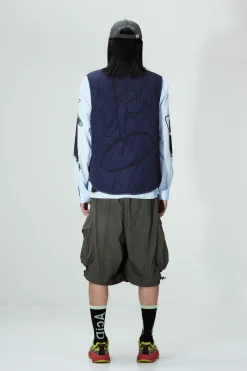 PENCHANT REVERSIBLE VEST